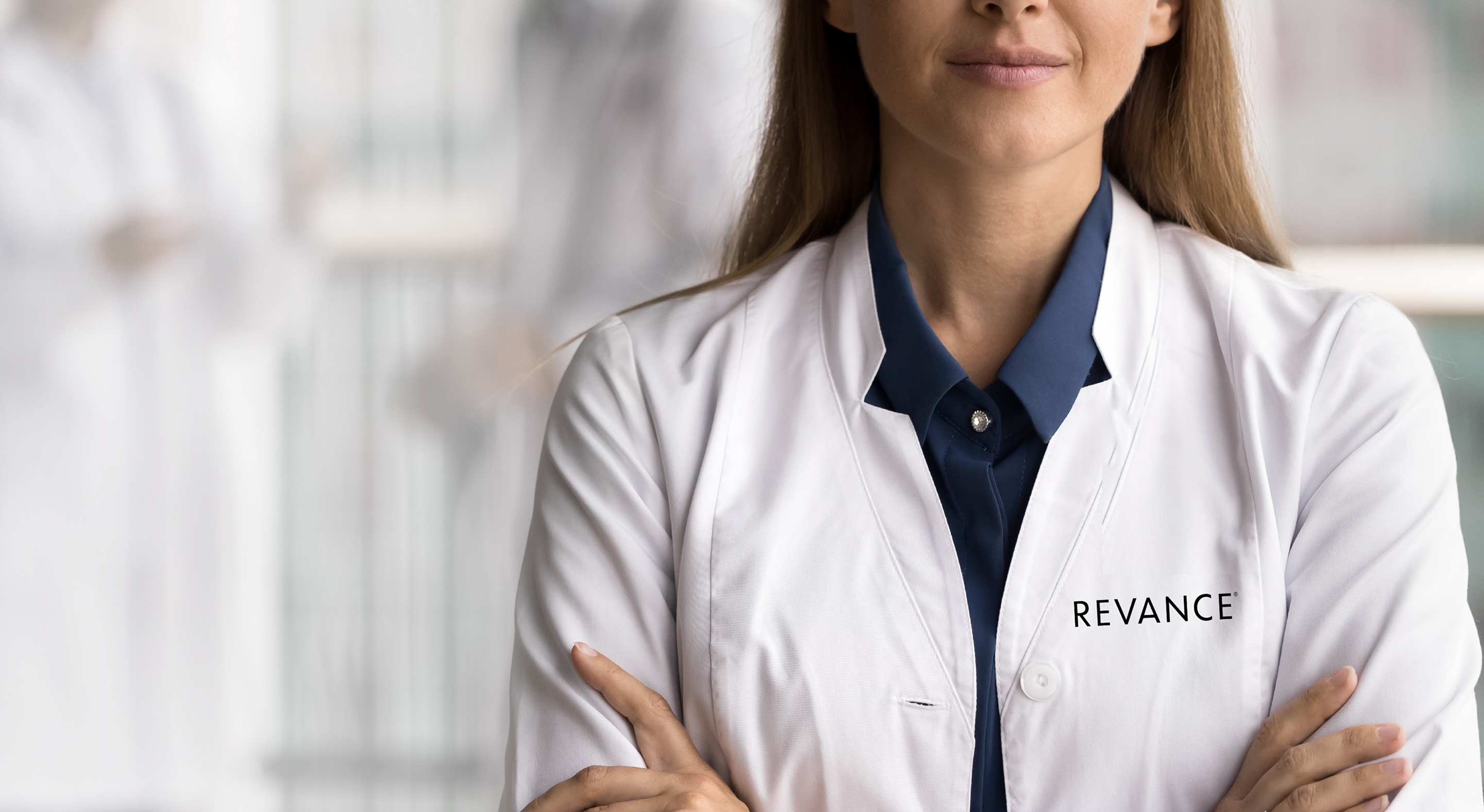 Revance aestehtics provider with a logo embroidered on scrubs